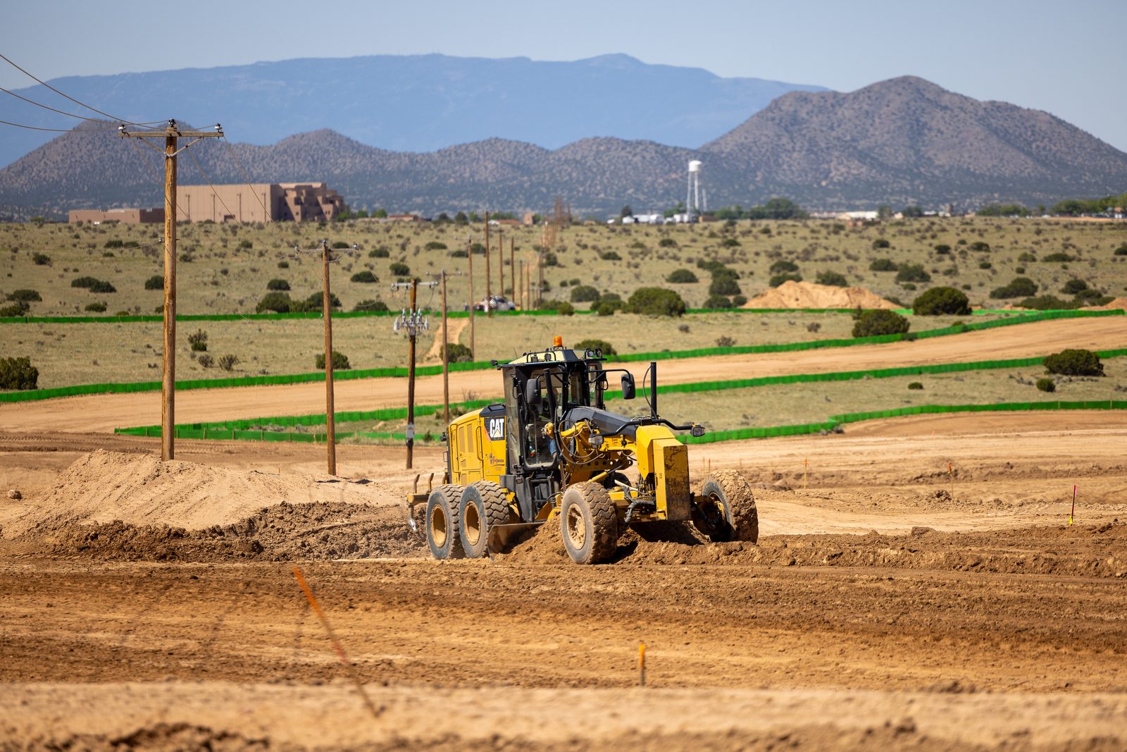 Motor grader performing earthwork